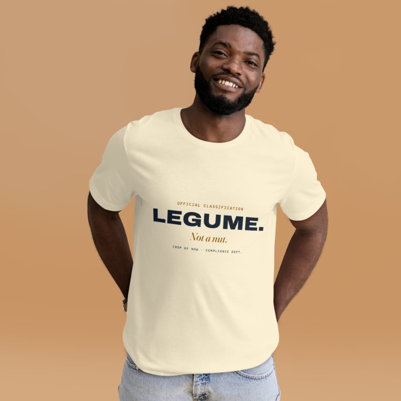 Cream t-shirt reading Official Classification: Legume. Not a nut.